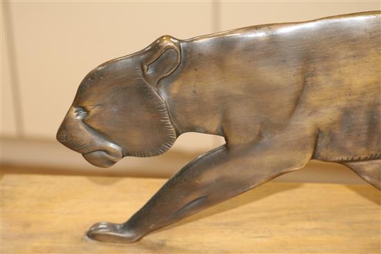 A French Art Deco bronze model of a prowling panther, width 27.5in.